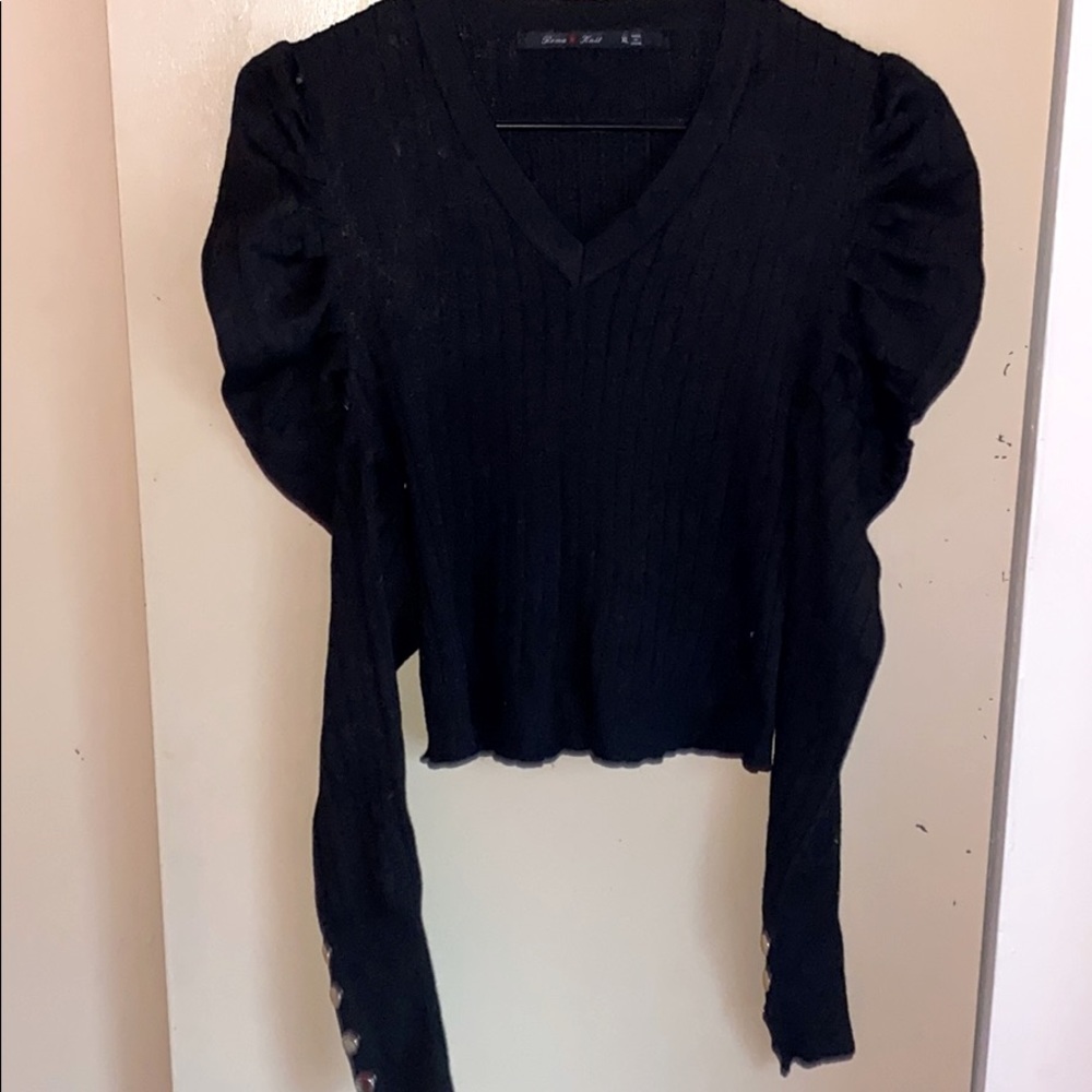 It's the sleeves and the arm accents for me